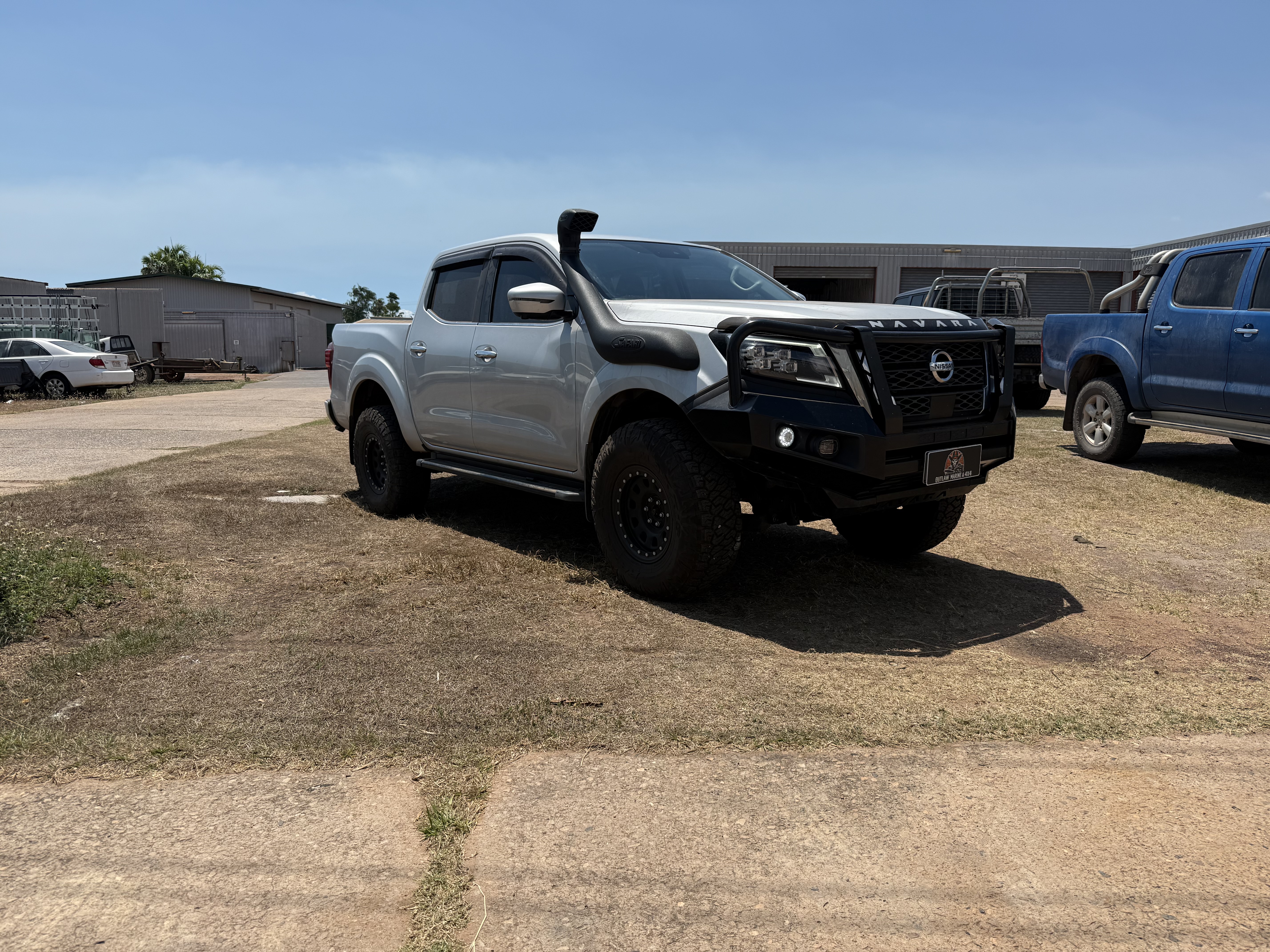 Steel bull bar fitted to the front of a 4x4 in the workshop
